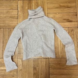 Grey turtleneck sweater